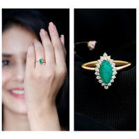 Elongated Marquise Cut Emerald Engagement Ring with Diamond Halo