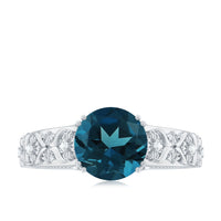 8mm round London Blue Topaz vintage engagement ring by Rosec Jewels featuring a sparkling blue gemstone and intricate band detail.