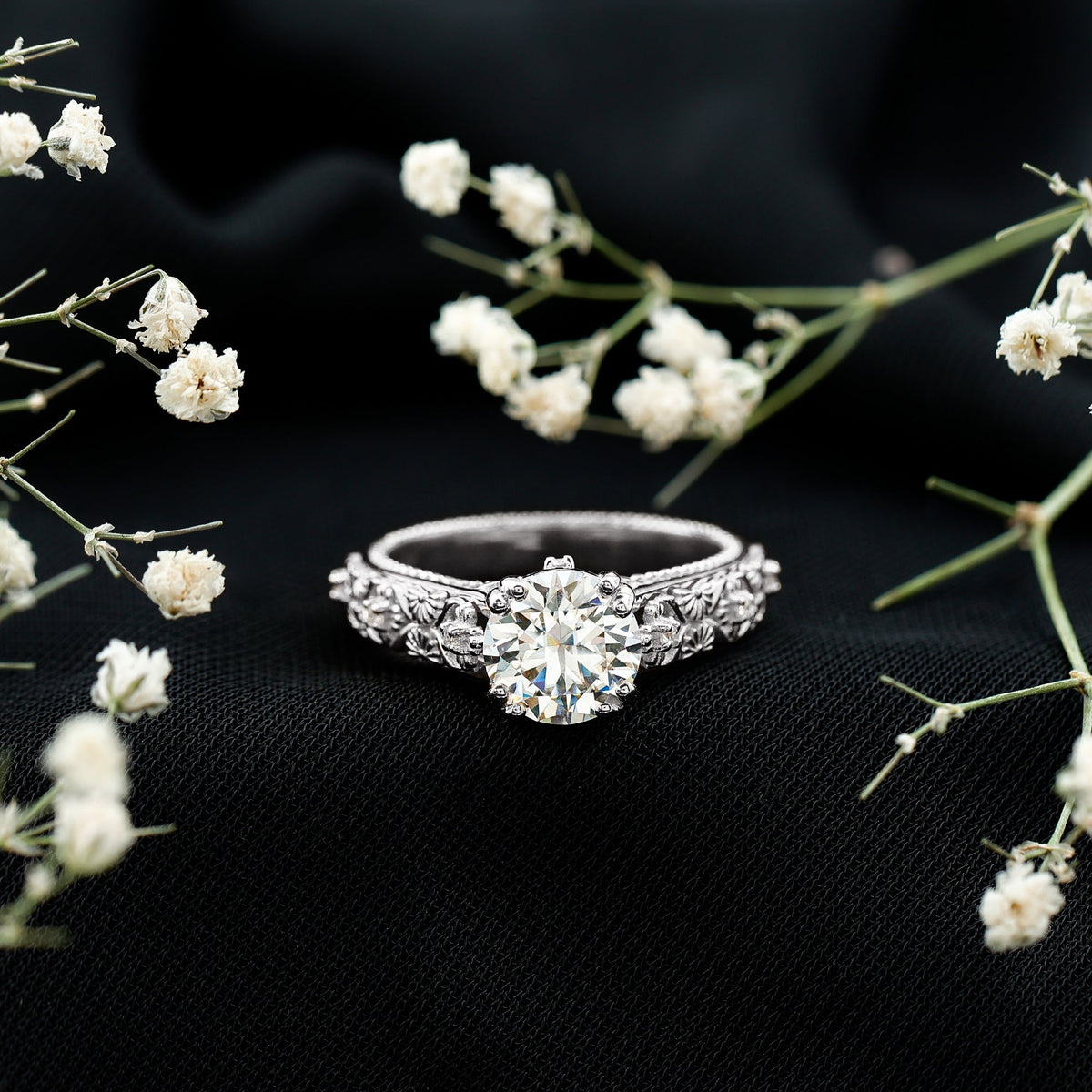 Vintage 2 Carat Moissanite double prong engagement ring by Rosec Jewels, showcasing detailed design and sparkling center stone.
