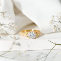 Vintage-style 2 carat moissanite engagement ring with double prong setting from Rosec Jewels, showcasing intricate band details.