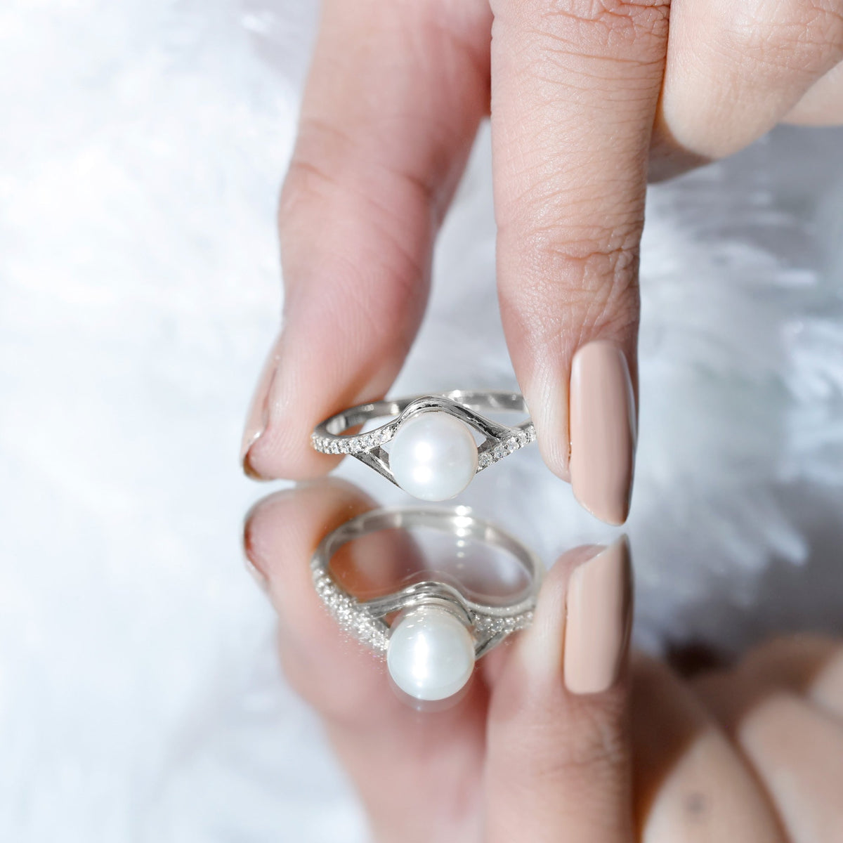 Freshwater pearl engagement ring with 7.4 carats and diamond split shank by Rosec Jewels, featuring a prominent pearl centerpiece.