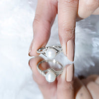 Freshwater pearl engagement ring with 7.4 carats and diamond split shank by Rosec Jewels, featuring a prominent pearl centerpiece.