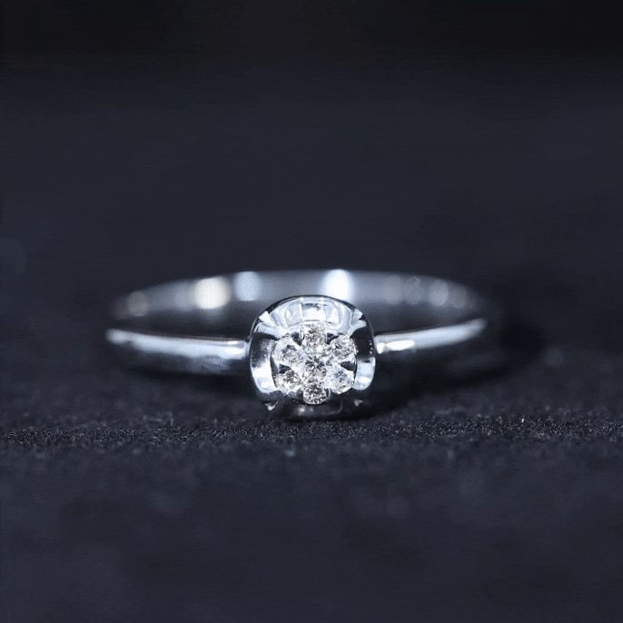 Round shape diamond promise ring in illusion setting by Rosec Jewels, featuring sparkling diamonds on a polished band.