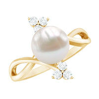 Cultured 7.48 carat white pearl bypass engagement ring with diamonds from Rosec Jewels featuring elegant design and sparkling accents.