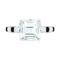 Claw Set Moissanite Engagement Ring With Black Diamond