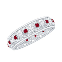 Natural ruby Celtic knot wedding band for women by Rosec Jewels, featuring intricate gold design and vibrant ruby accents.