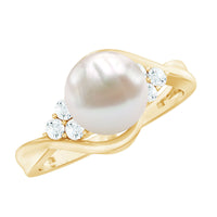Natural 7.4-carat freshwater pearl engagement ring with diamond trio by Rosec Jewels, featuring an elegant ring design.