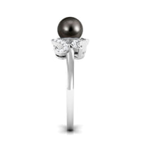 Elegant Tahitian pearl engagement ring with diamond accent from Rosec Jewels, showcasing a luxurious pearl centerpiece and sparkling details.