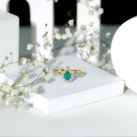 Pear Shaped Emerald Nature Engagement Ring with Diamond