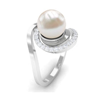 Natural 7.4 carat freshwater pearl engagement ring with diamond bypass shank by Rosec Jewels, showcasing elegant design and craftsmanship.