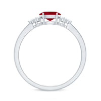 Rosec Jewels East West Style 0.6 Carat Ruby Oval Promise Ring with Diamond, showcasing the elegant gold band and vibrant red ruby.