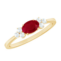 East West style 0.6 carat ruby oval promise ring with diamond accents by Rosec Jewels, featuring a elegant gold band and vibrant gemstone.