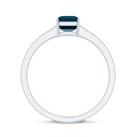 Rosec Jewels 6x8mm London Blue Topaz solitaire ring with emerald cut and certification, showcasing the elegant gemstone setting.