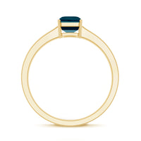 Rosec Jewels 6x8mm London Blue Topaz solitaire ring with emerald cut and certificate, showcasing the elegant gemstone and band.