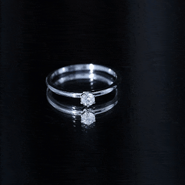Rosec Jewels diamond promise ring with a peg head design, featuring a yellow band and sparkling diamonds for her.