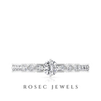 Shimmery Diamond Solitaire Engagement Ring with Side Stone