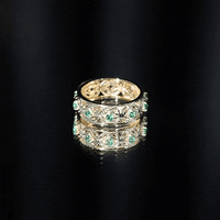 Vintage-looking lab grown emerald wedding band for women by Rosec Jewels, featuring a classic ring design with sparkling green emeralds.