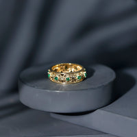 Vintage-looking lab grown emerald wedding band for women, featuring intricate design and vibrant green emeralds, by Rosec Jewels.