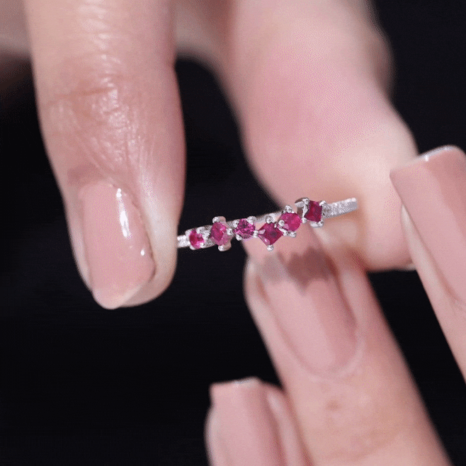 Lab grown ruby and diamond half eternity ring by Rosec Jewels, showcasing yellow gold band with sparkling gemstones.