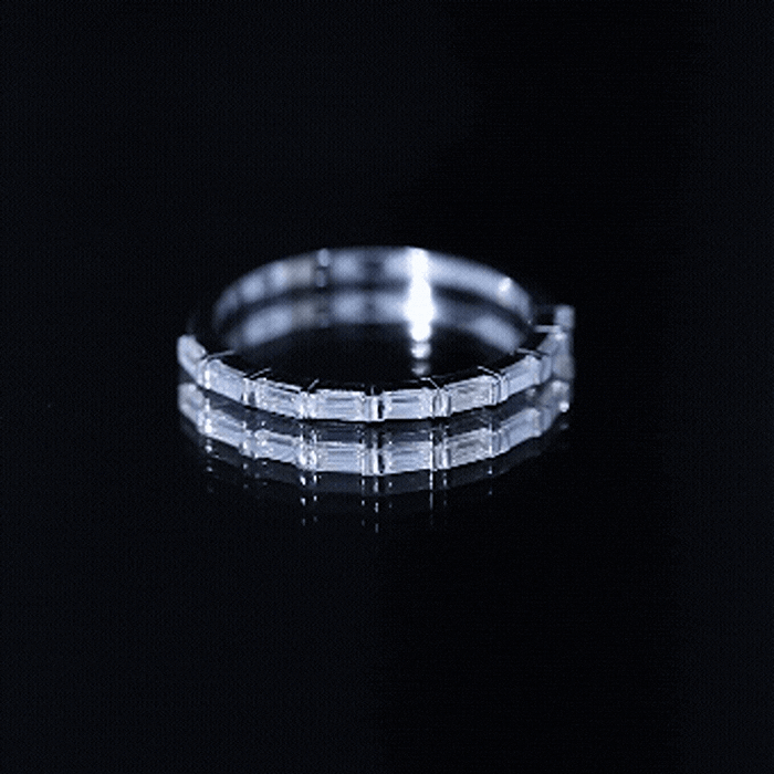 Yellow gold moissanite eternity ring with east-west design from Rosec Jewels, showcasing a continuous row of sparkling stones.