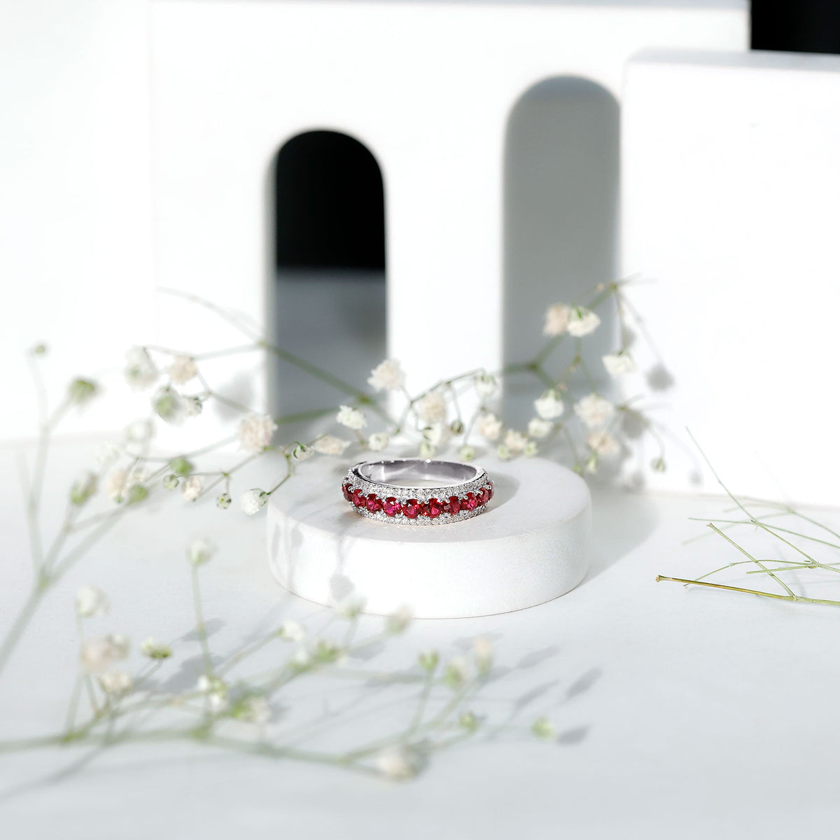 Lab-created ruby and diamond wedding anniversary ring by Rosec Jewels, featuring a sparkling ruby centerpiece with diamond accents.
