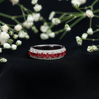 Lab-created ruby and diamond wedding anniversary ring by Rosec Jewels featuring a band with vibrant red rubies and sparkling diamonds.
