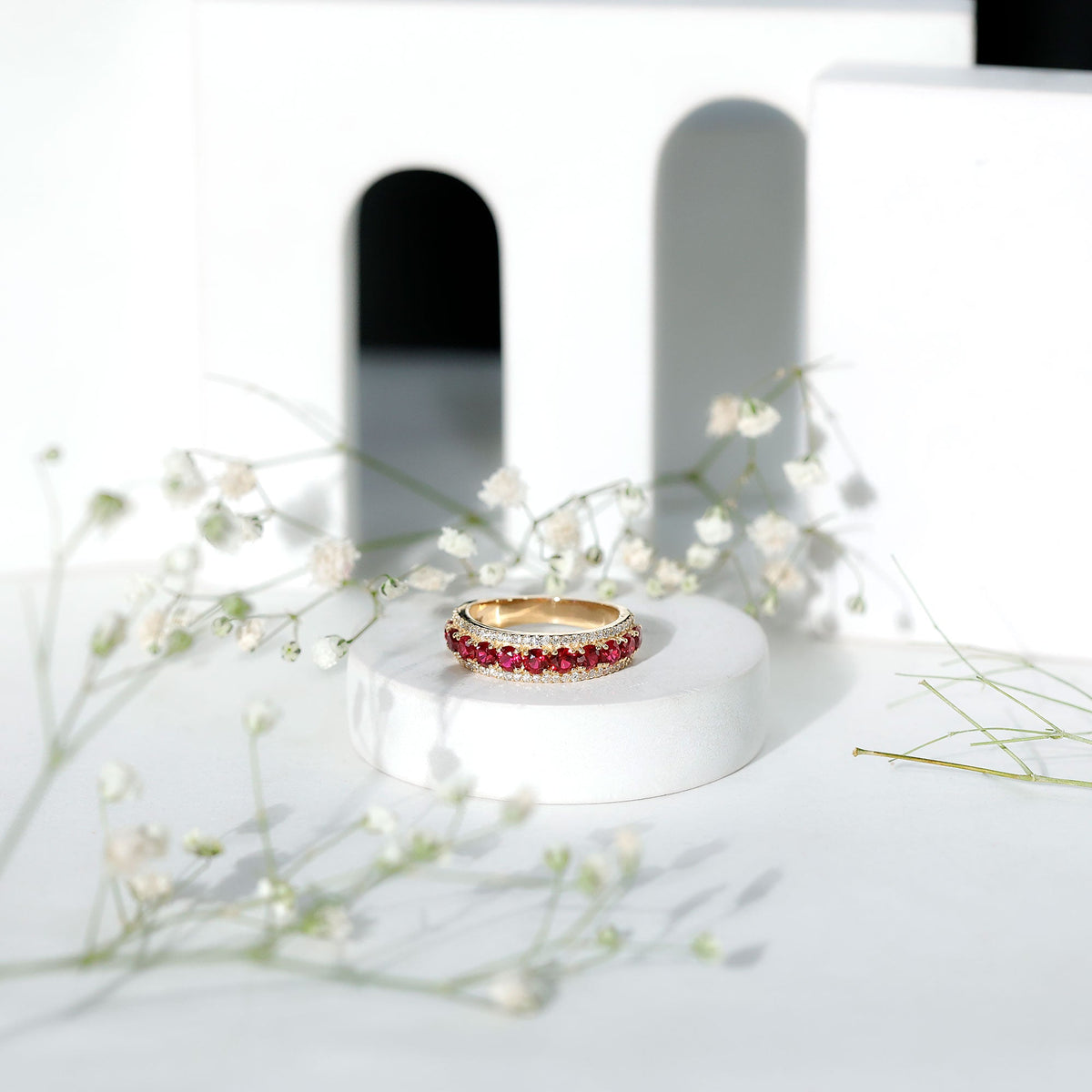 Lab-created ruby and diamond wedding anniversary ring from Rosec Jewels featuring a sparkling band with a certificate of authenticity.