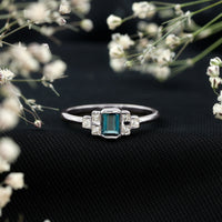 0.7 Carat Emerald Cut London Blue Topaz Statement Ring with Diamond