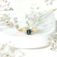 0.7 Carat Emerald Cut London Blue Topaz Statement Ring with Diamond