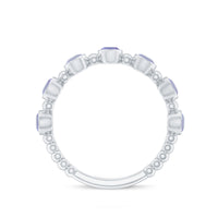 Natural Tanzanite Half Eternity Ring in Bezel Setting