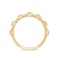 Natural Tanzanite Half Eternity Ring in Bezel Setting