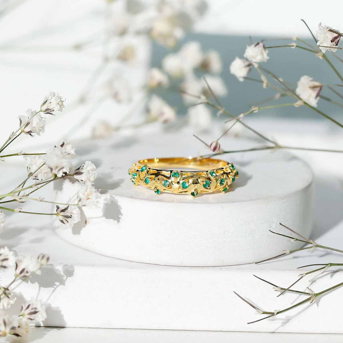 Natural emerald filigree wedding band for women by Rosec Jewels, featuring intricate gold filigree and vibrant green emeralds.