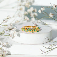 Natural emerald filigree wedding band for women by Rosec Jewels, featuring intricate gold filigree and vibrant green emeralds.