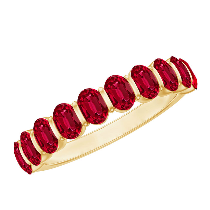 Oval cut created ruby half eternity ring in bar setting by Rosec Jewels, showcasing sparkling ruby stones around the band.