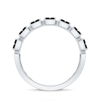 Lab grown black and white diamond baguette half eternity ring by Rosec Jewels, showcasing alternating diamond stones in a sleek band.