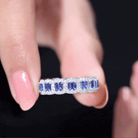 Lab-grown blue sapphire eternity wedding band with diamonds, yellow gold ring from Rosec Jewels featuring alternating stones.