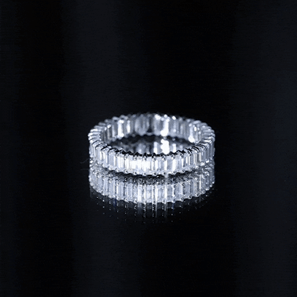 Yellow gold Baguette Cut Moissanite eternity ring in shared prong setting from Rosec Jewels, showcasing sparkling gemstones.