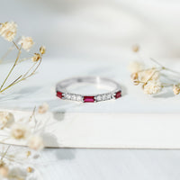 Vintage eternity ring with baguette cut lab-grown ruby and diamond accents, crafted by Rosec Jewels.