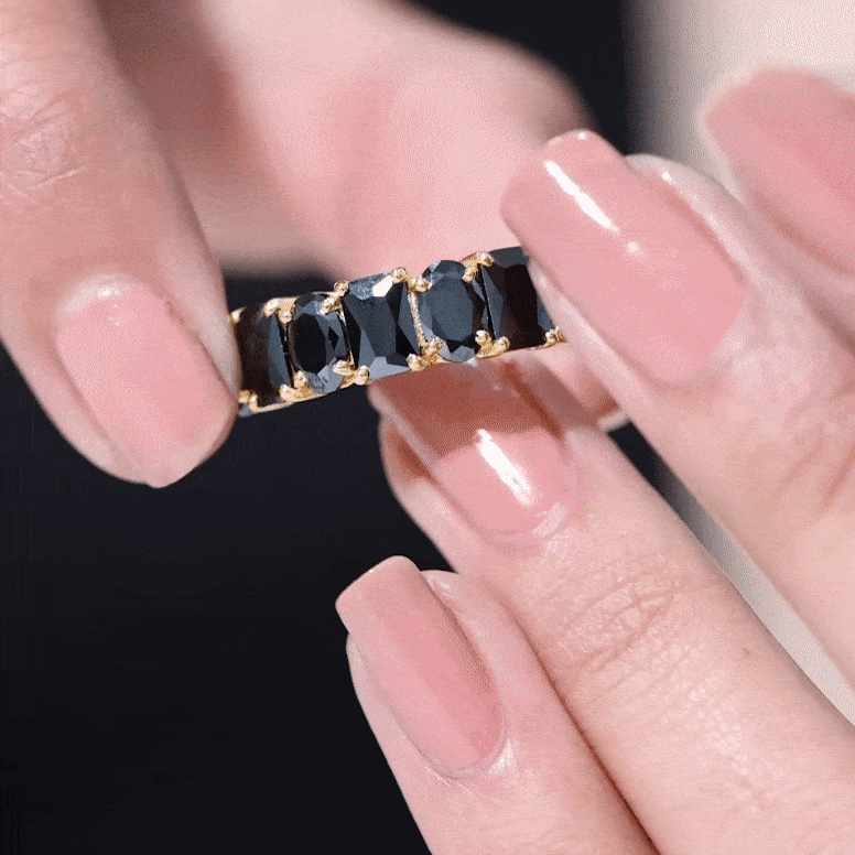 Oval and emerald cut black onyx half eternity wedding band by Rosec Jewels, featuring alternating black onyx stones in a sleek ring design.