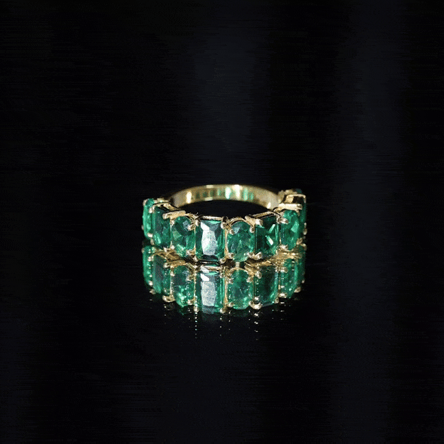 Yellow gold lab-grown emerald wedding band by Rosec Jewels, featuring a sleek ring design with vibrant green emeralds.