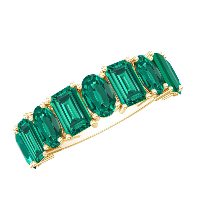 Lab grown emerald wedding anniversary ring by Rosec Jewels featuring a vibrant green emerald gemstone in a elegant band.