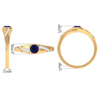 Bezel set blue sapphire and diamond men's engagement ring by Rosec Jewels, showcasing a sleek band with vibrant gemstone accents.