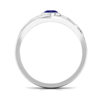 Bezel set blue sapphire and diamond men's engagement ring from Rosec Jewels, featuring a sleek band and sparkling stones.