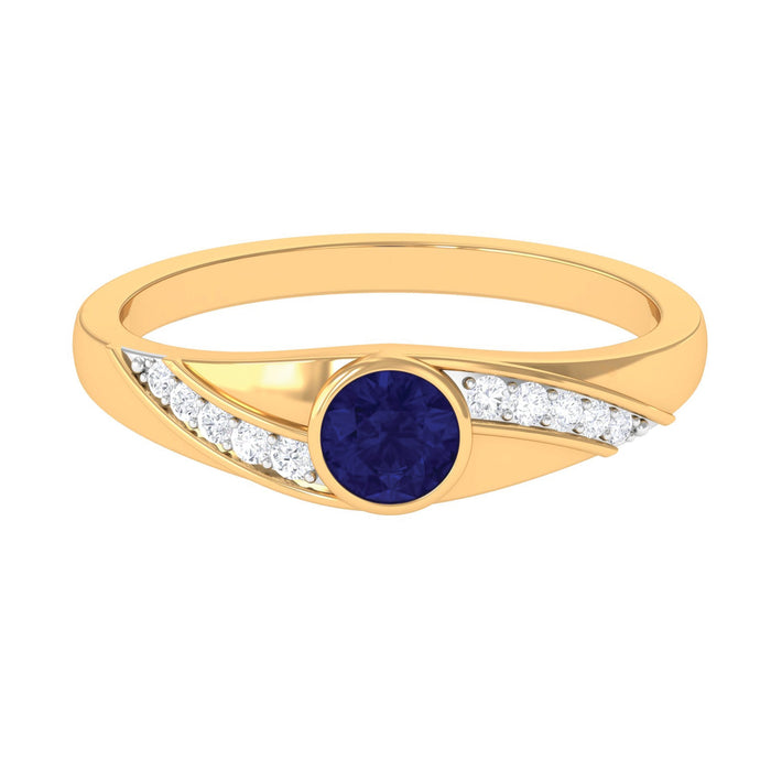 Bezel set blue sapphire and diamond engagement ring for men by Rosec Jewels, featuring a sleek band with blue gemstone and sparkling diamonds.