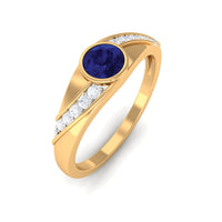 Bezel set blue sapphire and diamond men's engagement ring by Rosec Jewels featuring a sleek band and sparkling gemstones.