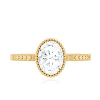 Solitaire Moissanite Oval Engagement Ring with Beaded Detailing
