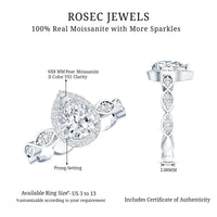 Moissanite teardrop engagement ring with scalloped shank by Rosec Jewels, featuring a sparkling gemstone and intricate band detail.