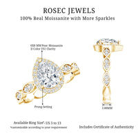 Moissanite teardrop engagement ring by Rosec Jewels featuring a scalloped shank and sparkling gemstone setting.