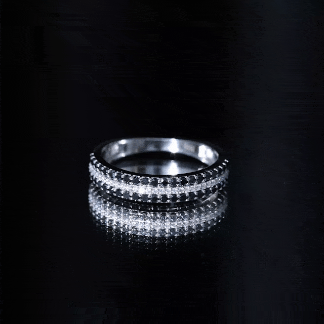 Black and white diamond three-row wedding band by Rosec Jewels, showcasing lab-grown diamonds in a sleek ring design.