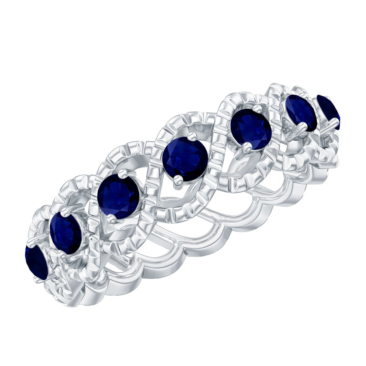 Natural blue sapphire infinity ring by Rosec Jewels featuring a band with blue sapphires and infinity symbol design.